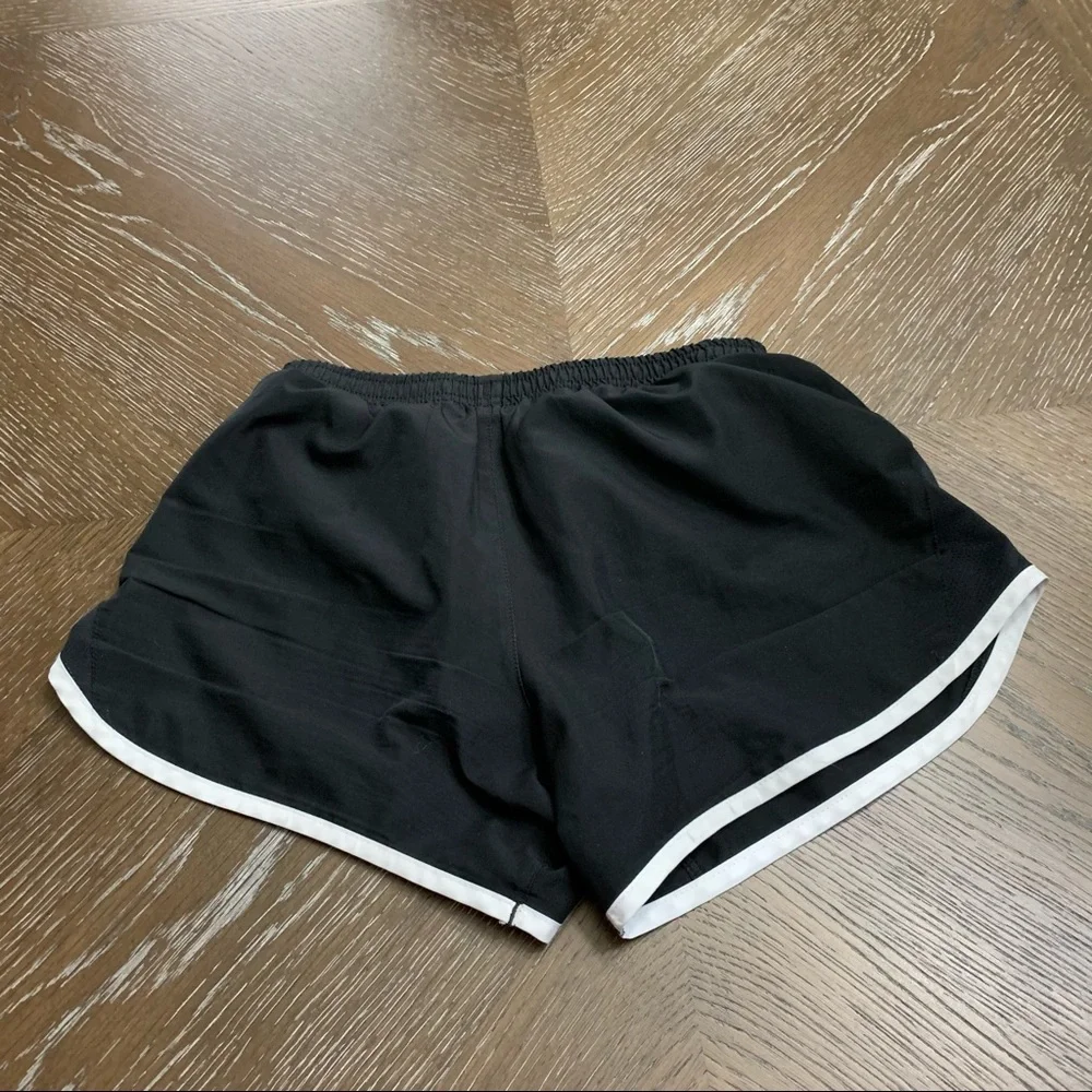 Nike black with white trim athletic shorts Size M